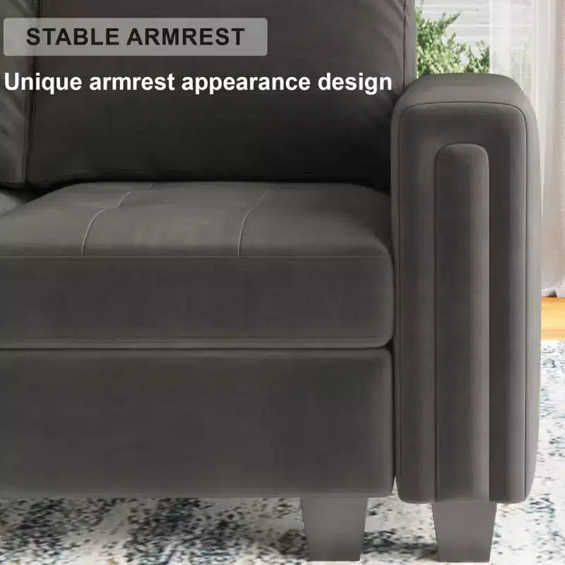Divano componibile a L in velluto trapuntato con pouf contenitore