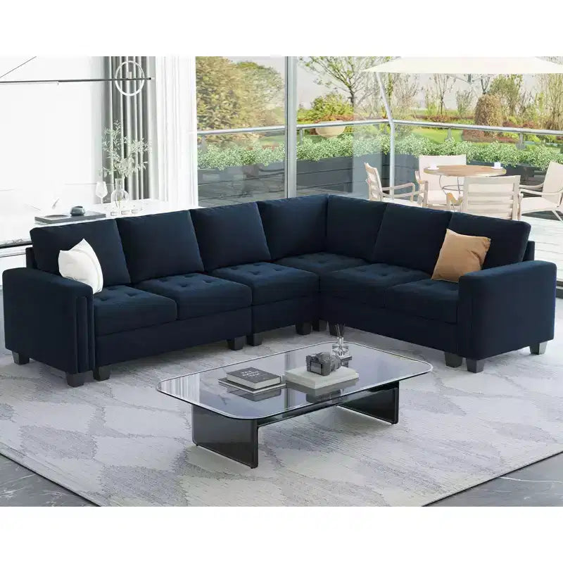 Divano componibile a L in velluto trapuntato con pouf contenitore